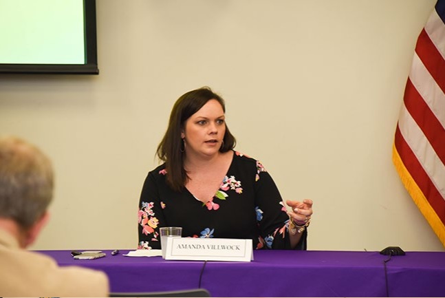 Amanda Villwock, Cyber Situational Awareness Analytics Branch, answers questions during Women-Owned Small Business Event