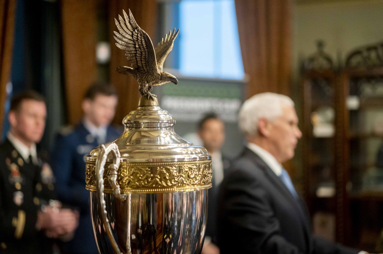 President's Cup trophy in foreground