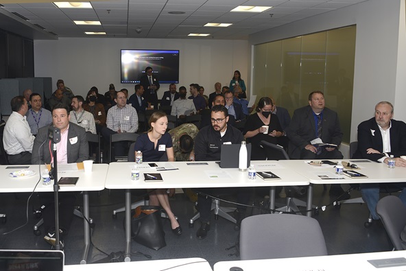 Image of Participants from throughout the intelligence community and Department of Defense awaiting the DISAWERX Artificial Intelligence Summit kick-off event at the DISAWERX lab in Columbia, Maryland. (DISA photo by Eric Glisson)