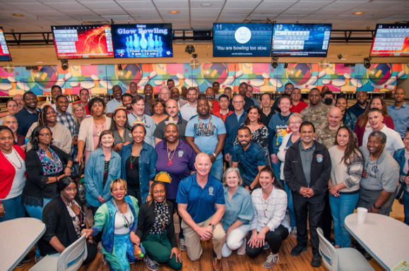 DISA Joint Service Provider personnel pose for a group photo during Employee Engagement Day.