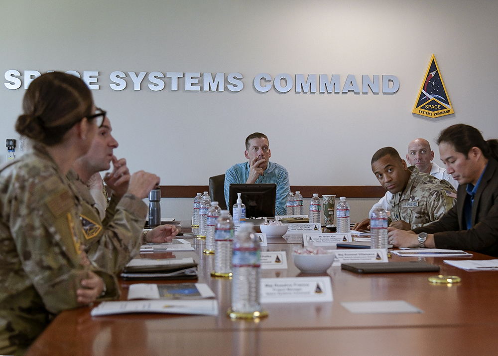 From left to right: U.S. Navy Capt. Calvin McGhee Naval Computer and Telecommunications Station Bahrain, U.S. Navy Cmdr. Beier, U.S. Naval Forces Central Command, 
