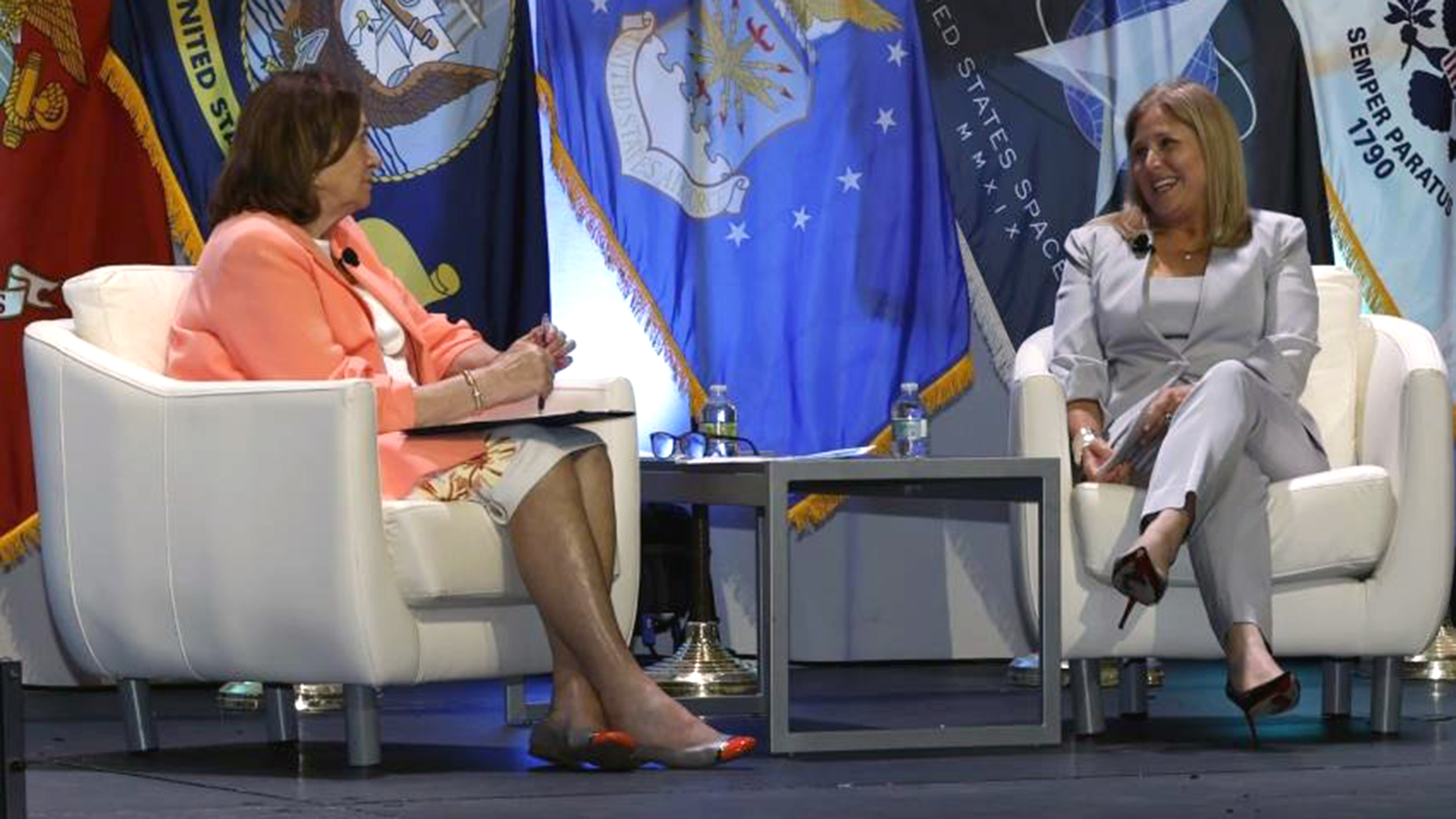 Photo of Retired Army Lt. Gen. Susan Lawrence, AFCEA International president and CEO, and Leslie Beavers, principal deputy DOD CIO. (Photo by SIGNAL Media)
