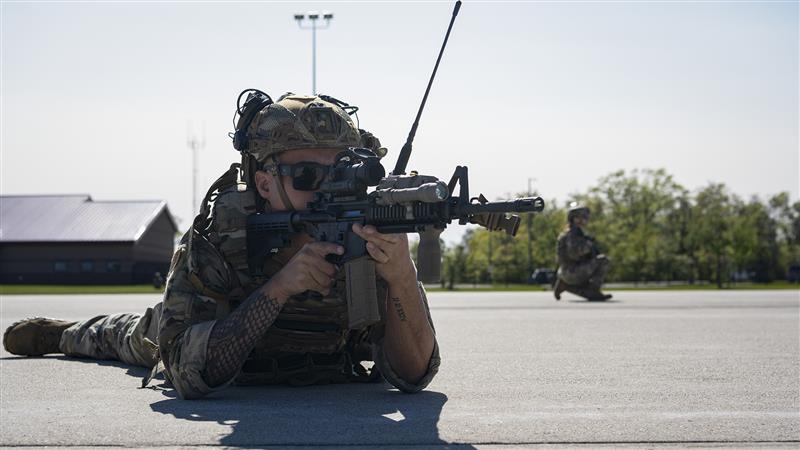 U.S. Air Force Staff Sgt. Radames Ten, security forces craftsman, 156th Security Operations Squadron, Puerto Rico Air National Guard, forms a perimeter during exercise Sentry North at Alpena Combat Readiness Training Center, Michigan.